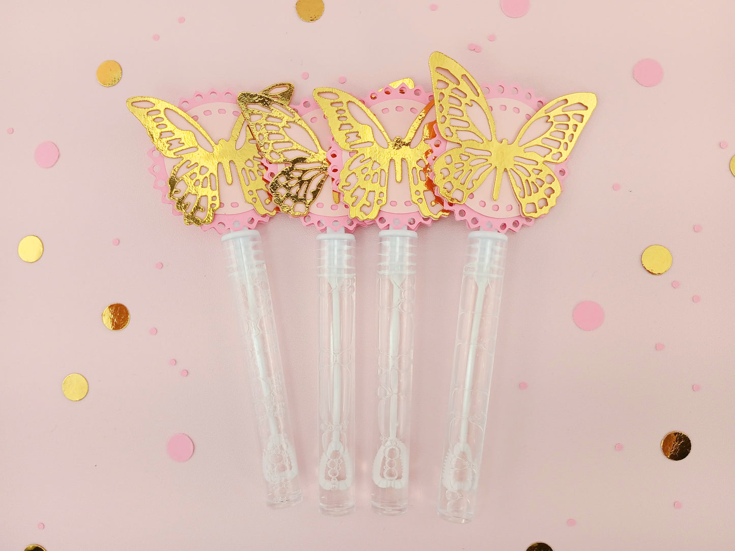 Set of four pink and gold foil butterfly bubble wands with shiny layered toppers, great for princess parties, bridal showers, or luxury favor bags