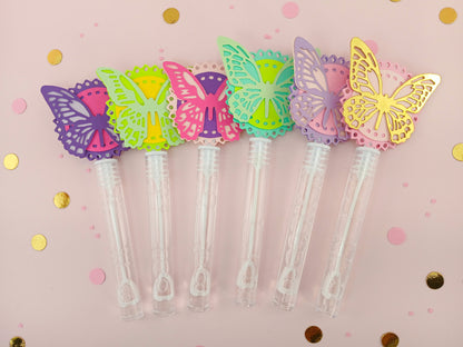 Set of six butterfly party bubble wands in assorted pastel colors with decorative paper toppers, perfect for birthday party favors or spring celebrations