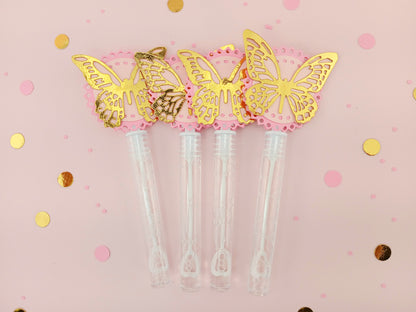 Set of four pink and gold foil butterfly bubble wands with shiny layered toppers, great for princess parties, bridal showers, or luxury favor bags